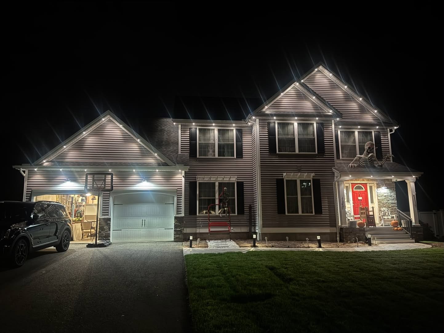 White roofline and peak lighting installed by JAS Lighting